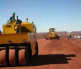 Shaping and compaction of wearing course surface Mine Haul Road Dust Suppression