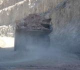 Overloaded Haul Truck in Open Pit Open Pit Dust Suppression