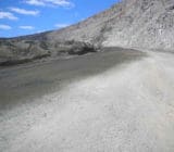 Durasolution treated and untreated open pit haul road Open Pit Fugitive Dust Containment