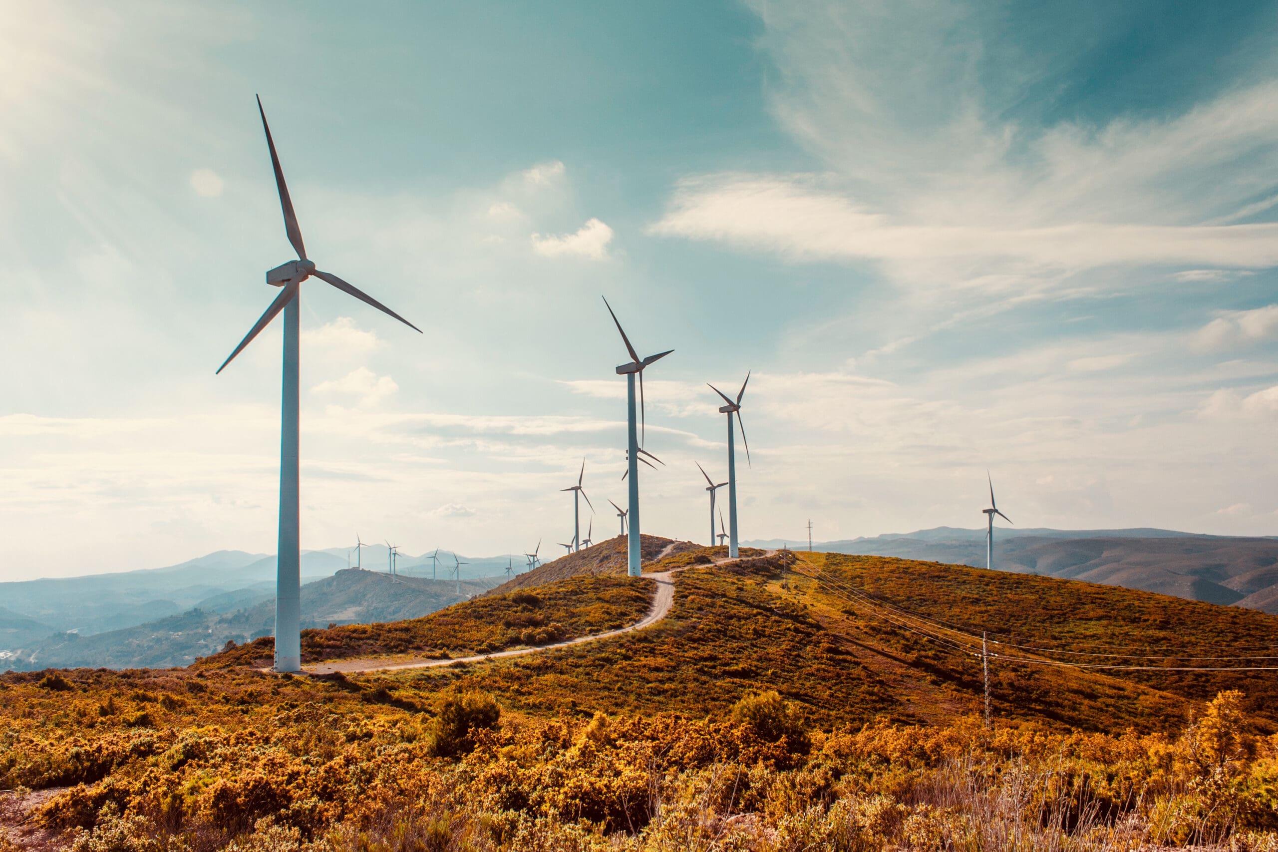 Wind turbines on beautiful sunny summer autumn mountain landsape Wind turbines on beautiful sunny summer autumn mountain landsape
